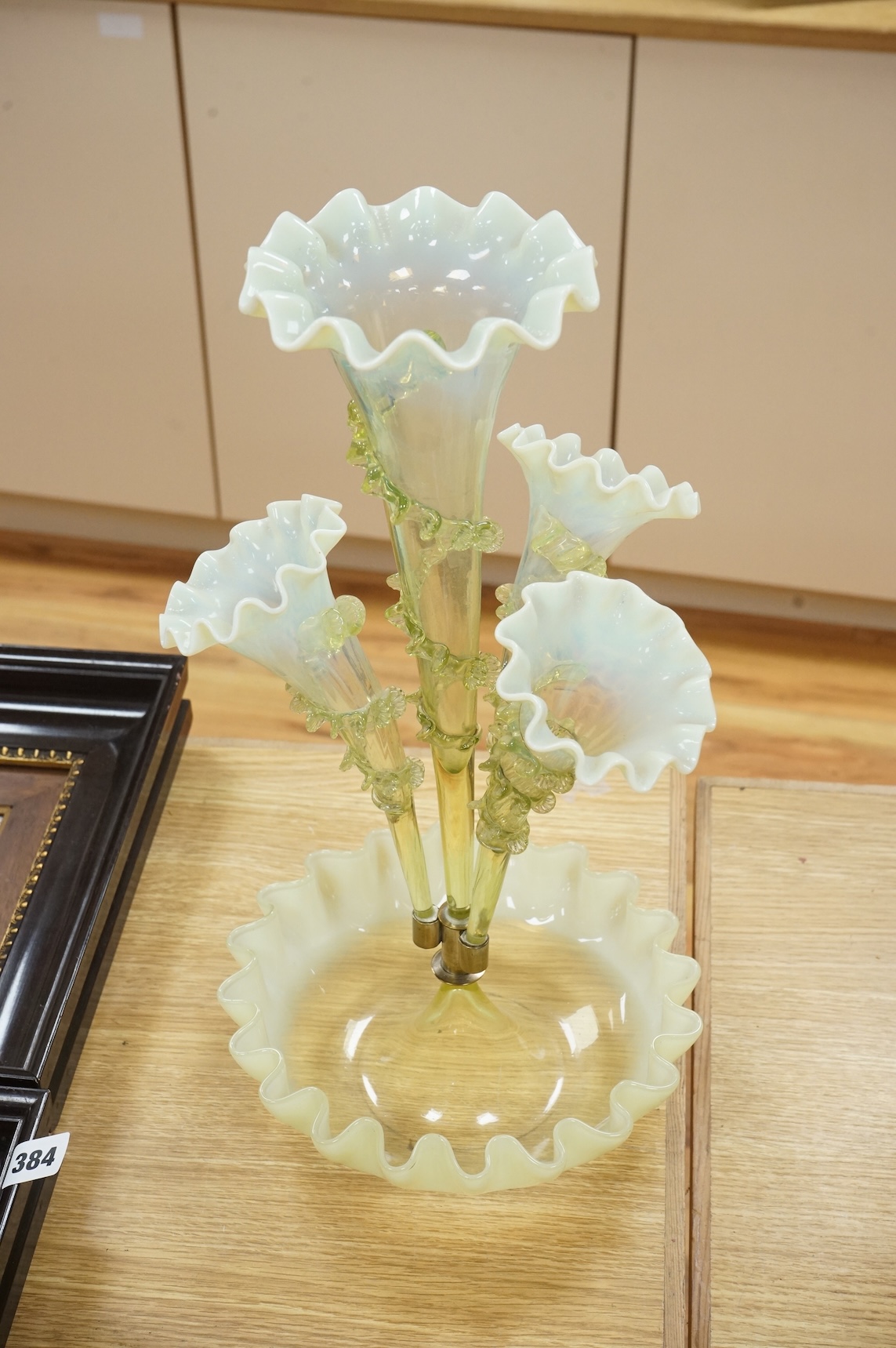 A 19th century Vaseline glass epergne, 44cm high